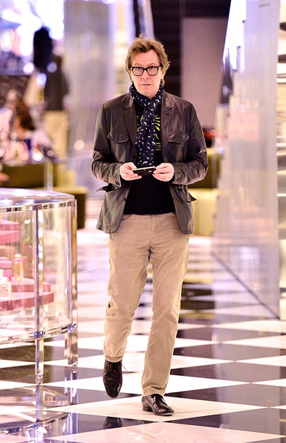 Gary Oldman in animal print scarf shopping with familyLainey Gossip ... image